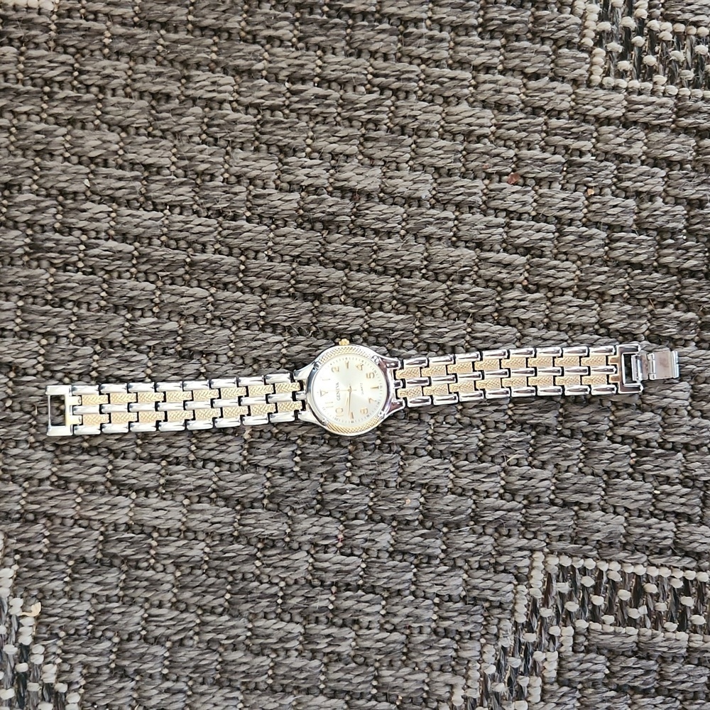 Geneva gold and‎ silver toned watch